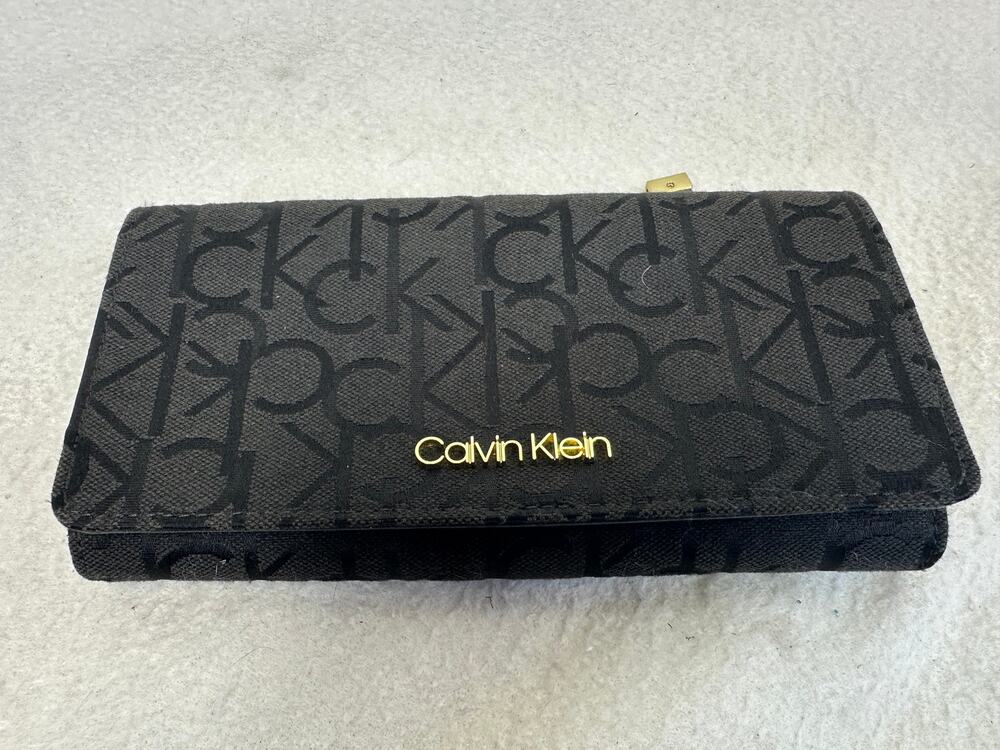 Calvin Klein Black Flap Monogram Tri-Fold Wallet with Gold-Tone Lettering